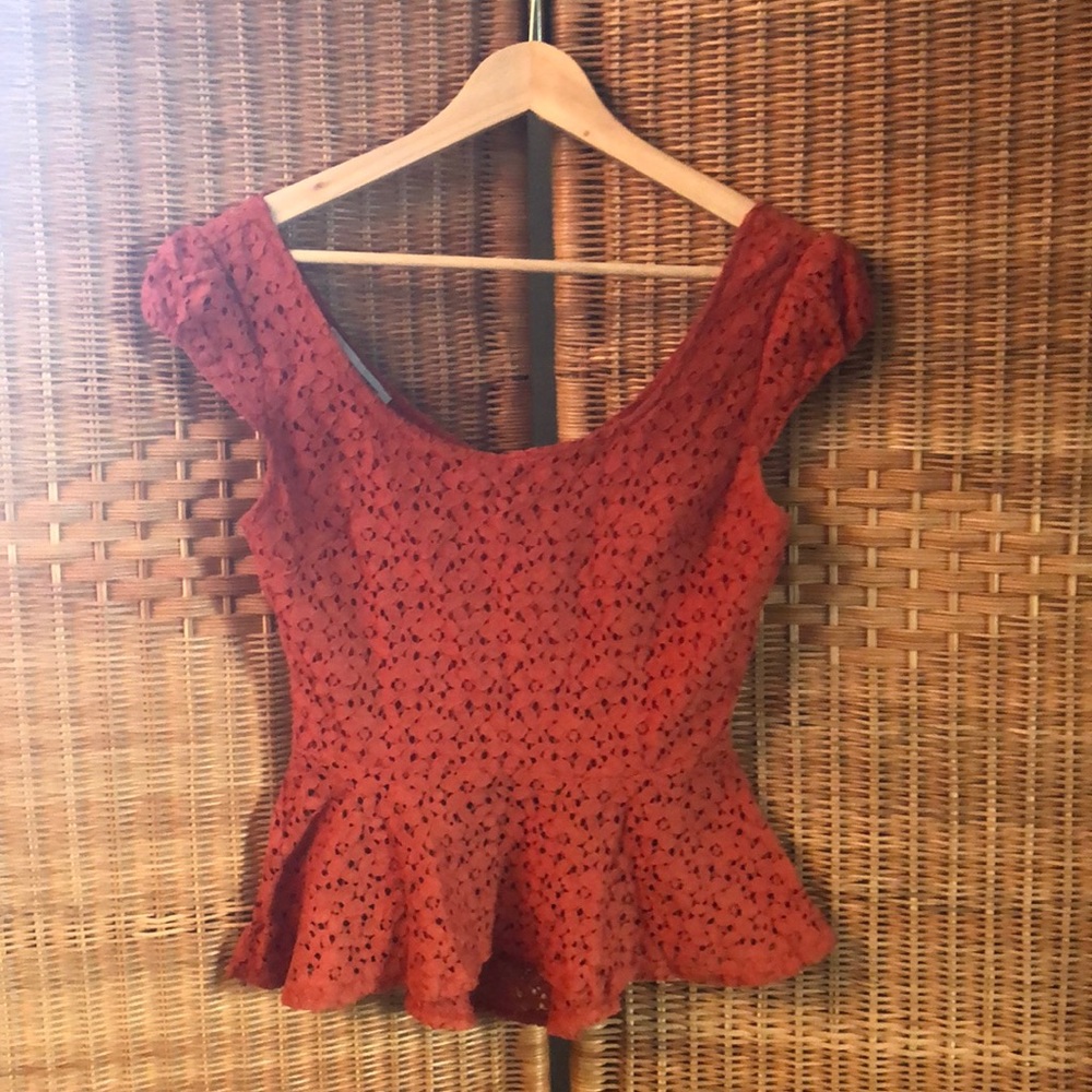 Crochet-style peplum top